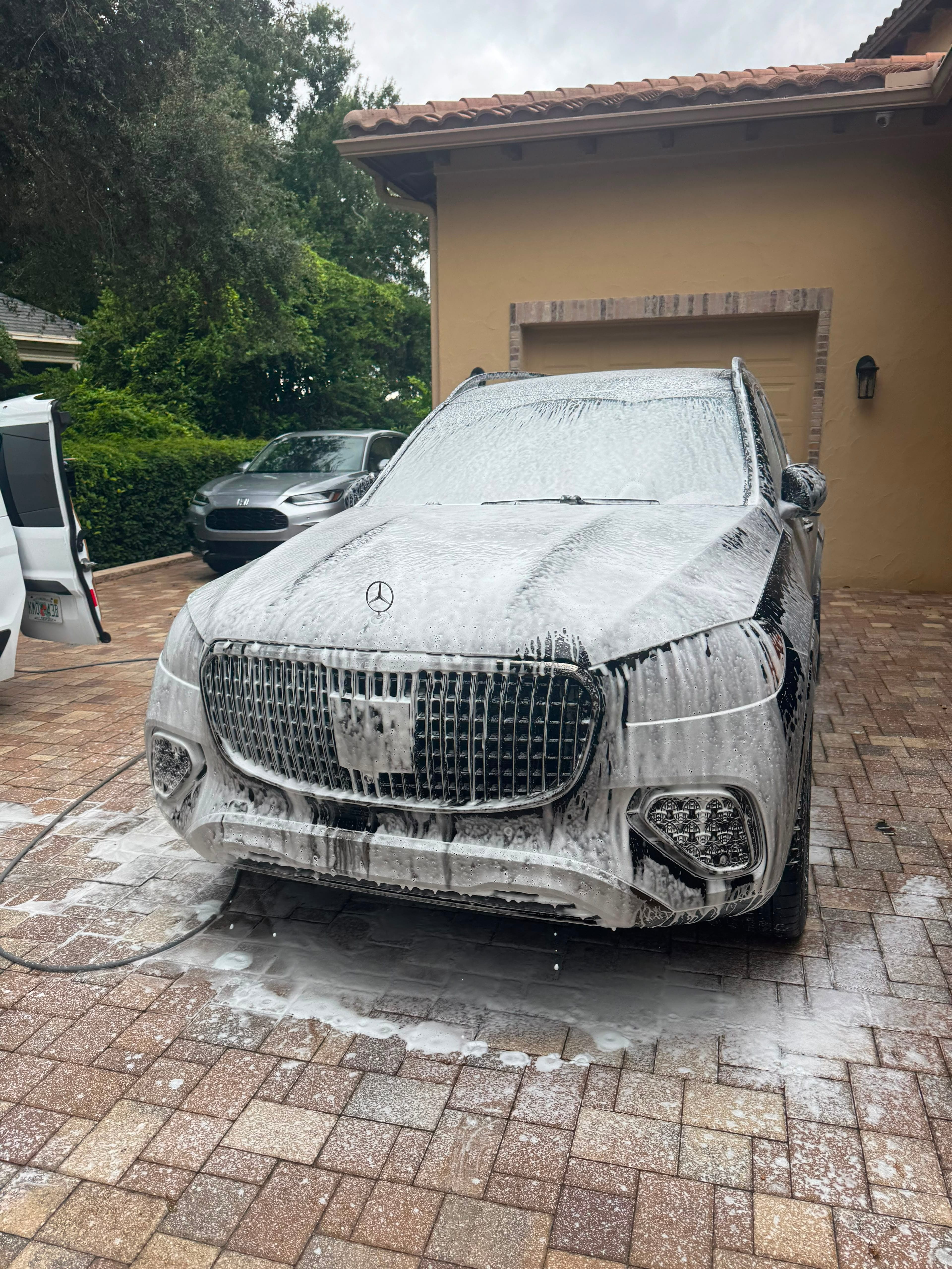 Mercedes-Maybach receiving a full foam wash